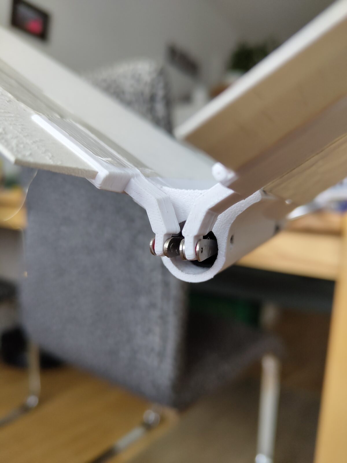 3D-gedruckte Steckverbindung zwischen Kohlefaser-Ausleger und Tragfläche